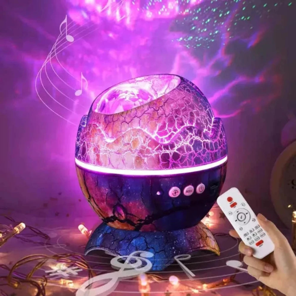 AstroEgg dinosaur egg projector glowing purple beside its remote control